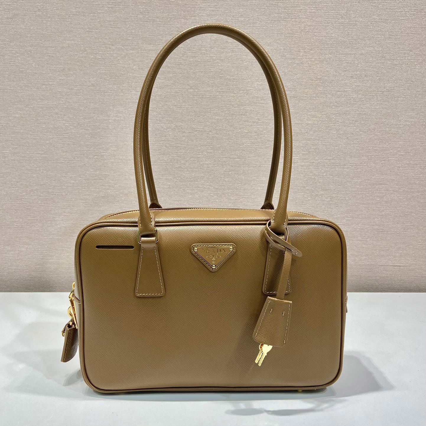 Pra*a top handle bags